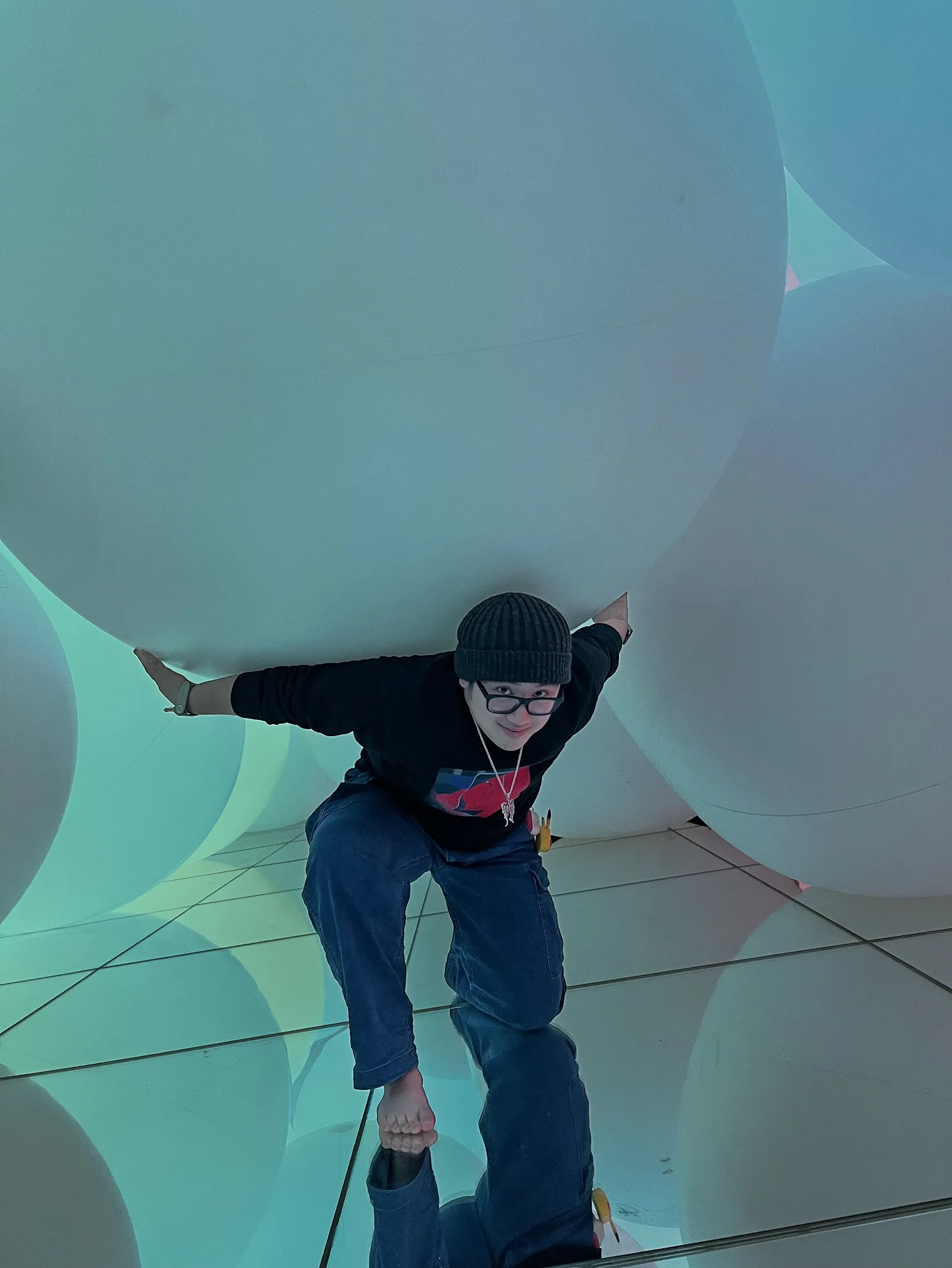 Nathaniel Mapaye inside an immersive balloon installation